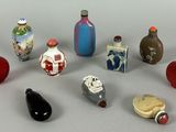 a lot of small bottles that are sitting on a table