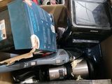a box full of assorted items in a garage
