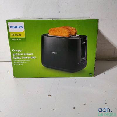 philips toaster with two slices of toast on top of it