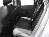 the back seats of a car are black and grey in color