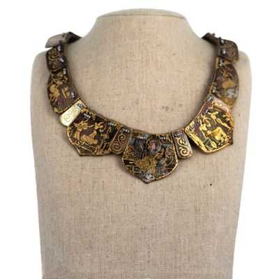 a close up of a necklace on a mannequin mannequin