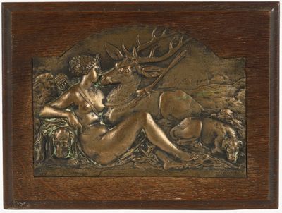 relief en bronze représentant une femme et un cerf dans un décor boisé