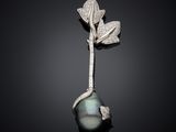 a black pearl and diamond broochle