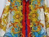 an image of a colorful jacket hanging on a hanger
