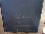 a black briefcase sitting on top of a wooden table