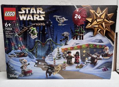 a box of lego star wars sets on a table