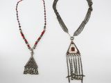 two silver and red beaded necklaces and a silver and red beaded necklace