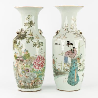pair of chinese vases decorated with women and flowers on a white background