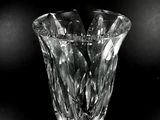 black and white photograph of a glass vase on a table