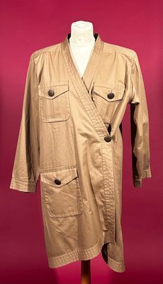 an image of a tan trench coat on a mannequin stand