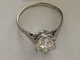 an image of a diamond ring with a price tag on it