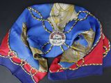 a blue and red scarf on a black table