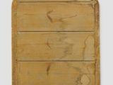 a wooden sign that is hanging on the wall