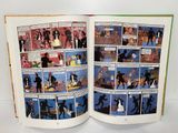 an open comic book with a picture of a man in a suit and tie