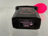 a pink microphone sitting on a clear table