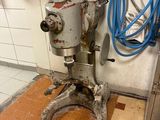 a machine that is sitting in the corner of a room