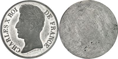an old silver coin with a woman ' s profile on it