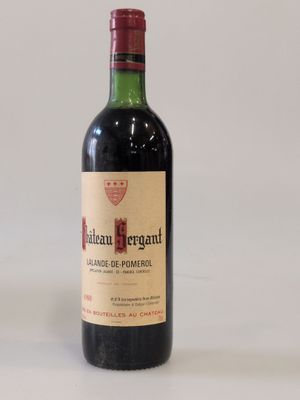 a bottle of wine that is sitting on a table