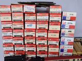 a lot of boxes stacked on top of each other on a table