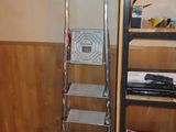 a ladder leaning against a wall in a room