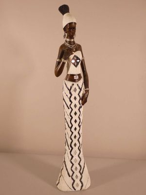 an image of a statue of a woman in a dress and hat