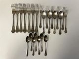 a lot of spoons and spoon spoons on the table