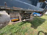 an image of a truck that is parked on the side of the road
