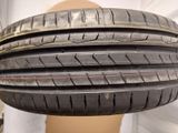 four tires stacked on top of each other on a mannequin