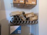 a closet with a lot of boxes and boxes on the shelves