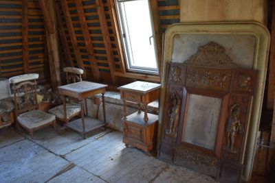 a room with a lot of furniture inside of it