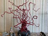 a sculpture of a tree that is sitting on a table