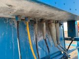 a lot of wires that are connected to the side of a boat