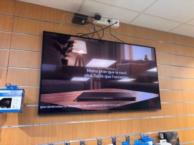 a large flat screen tv hanging on the wall
