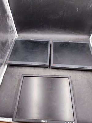 a metal box with two black trays inside of it