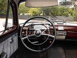 a view of the inside of a car from the driver ' s seat