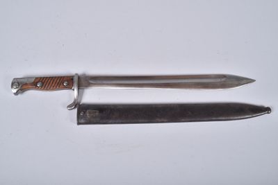 a knife and a knife holder on a table