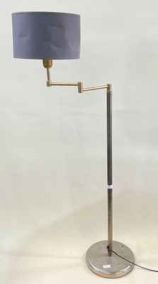 floor lamp with a blue shade on a metal base and a silver base