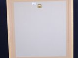 an easel with a white board on a stand against a blue background