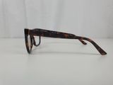 a close up of a pair of glasses on a white surface