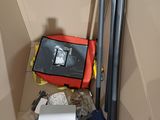 a picture of a bathroom with a toilet and a red bag on top of it