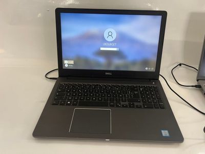 a laptop computer that is sitting on a table