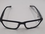 the glasses are black and have clear lenses on them