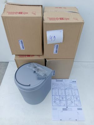 a box of boxes and a bucket on a table
