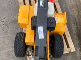 a small machine that is sitting on a pallet