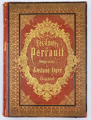 un vieux livre avec des lettres dorées sur une couverture rouge