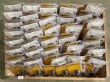 many bags of food in a wooden box on the floor