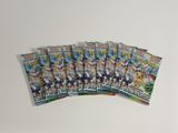 cinq paquets de cartes à collectionner Pokémon empilés les uns sur les autres