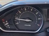 a close up of a car dashboard with a speedometer