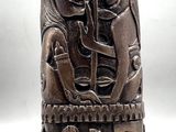 an image of a wooden sculpture of a woman and a man