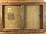 a picture of an old wooden cabinet with a glass door